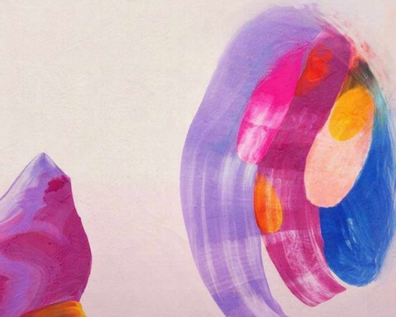 Watercolor brushstrokes on a light pink background
